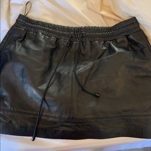 Black leather mini skirt